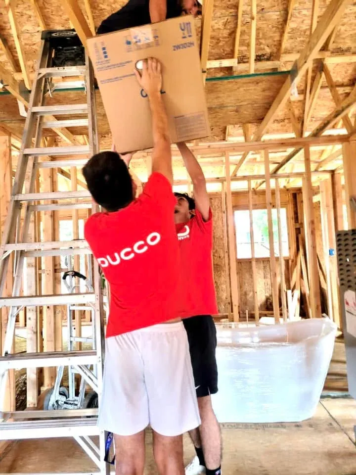 Ducco HVAC team installing equipment